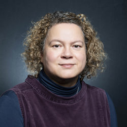 A professional portrait of Michelle Rice, Head of People and Engagement 