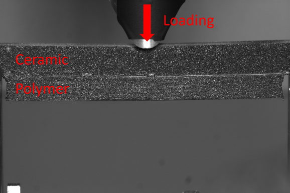 Experimental set up for 3-point bend loading for model composite armour.