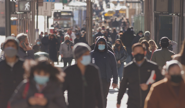 Crowd of people wearing face masks