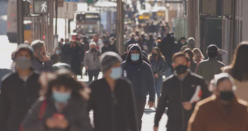 Crowd of people wearing face masks