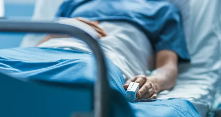 Patient in hospital bed