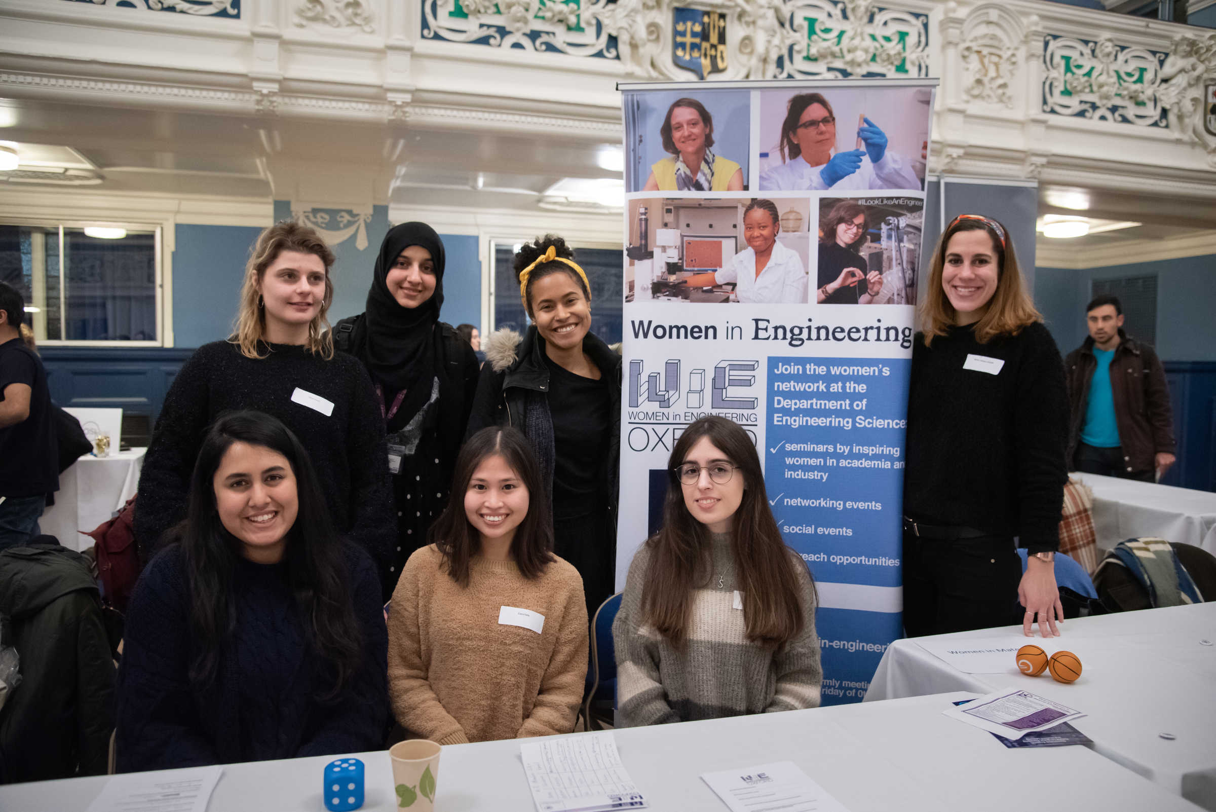 Female DPhil students at Women in STEM event in Oxford Town Hall, January 2020. Stood by Women in Engineering network banner