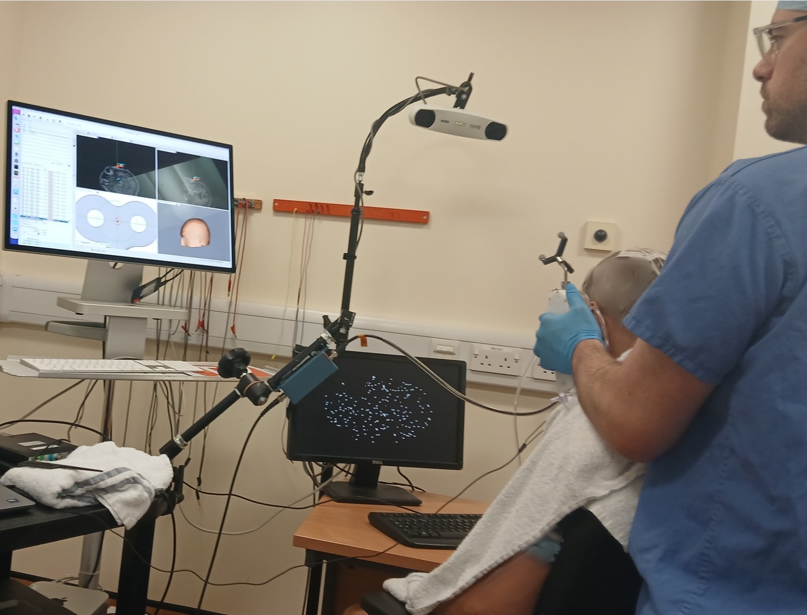 Participant undergoing TUS while carrying out a reaction-time test.