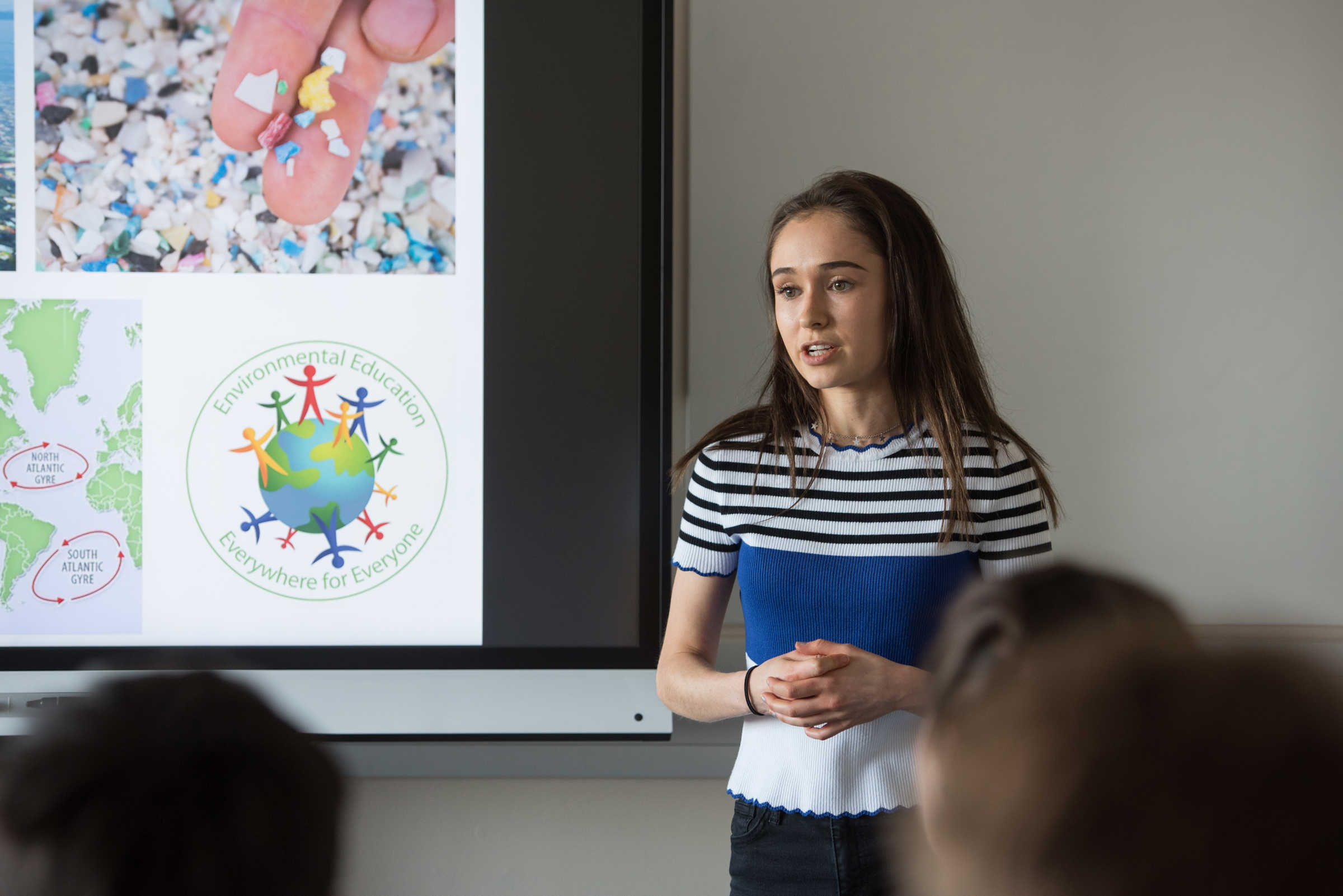 Student giving presentation on environment