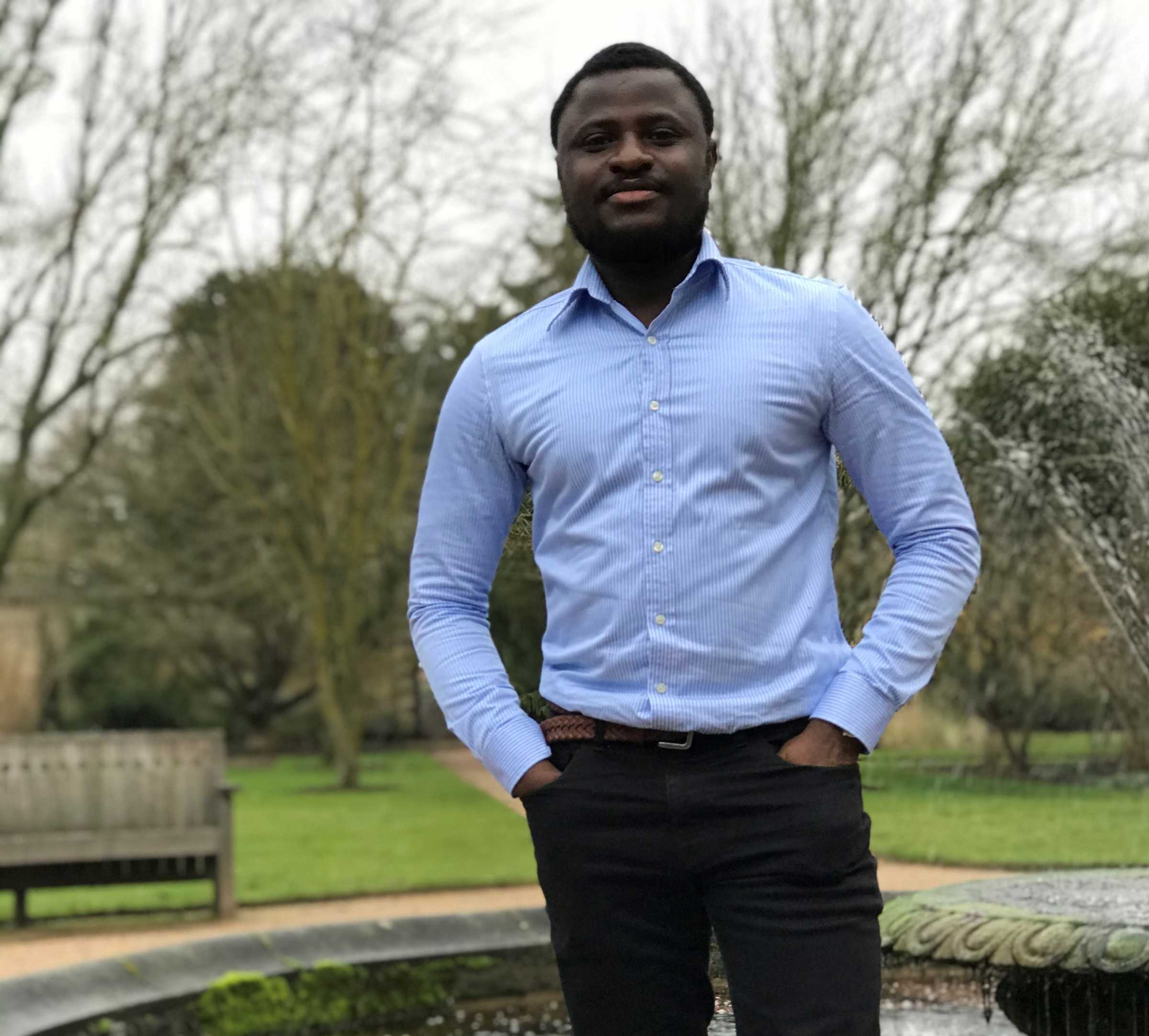 Young man smiling in smart clothes
