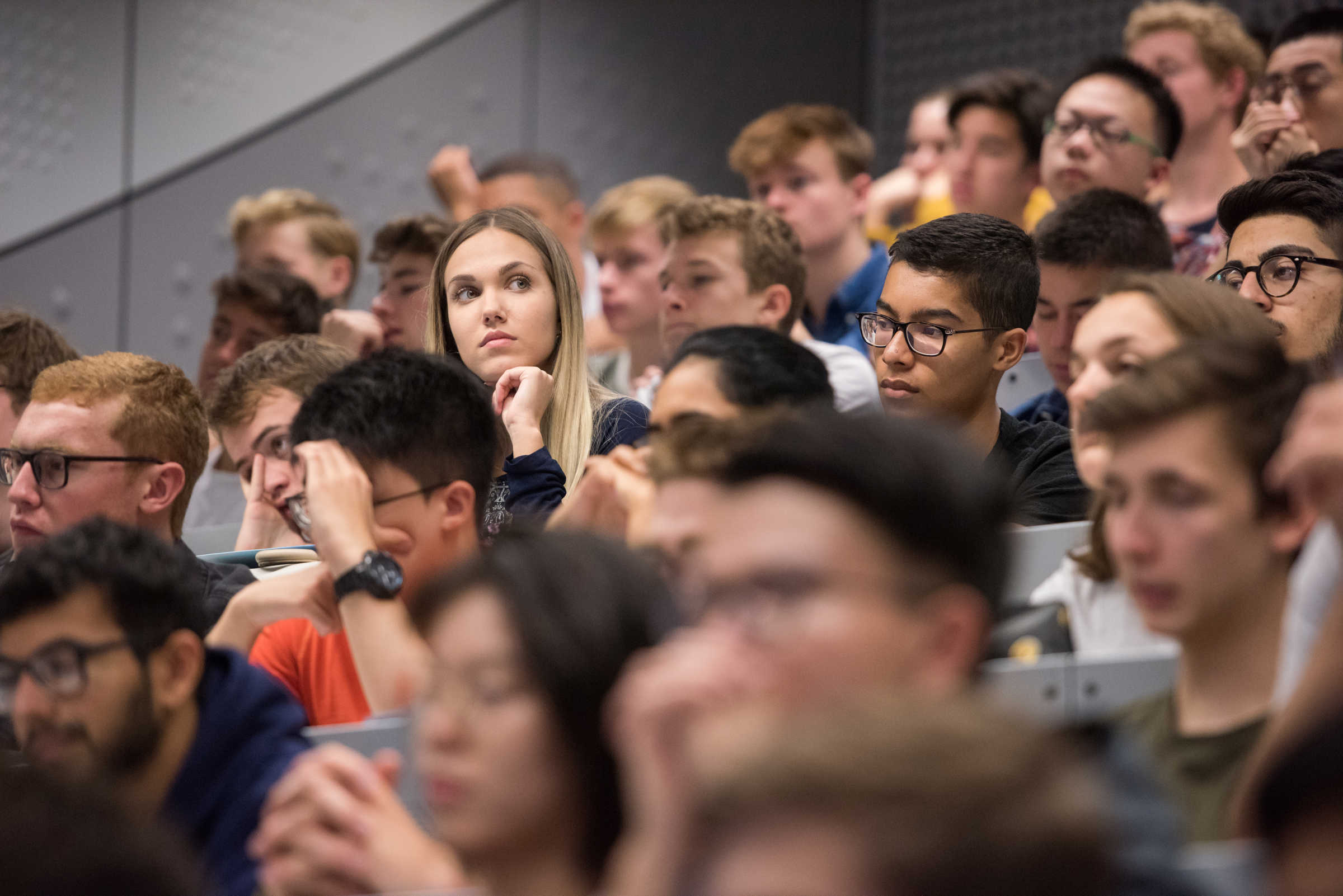 Full lecture theatre of students