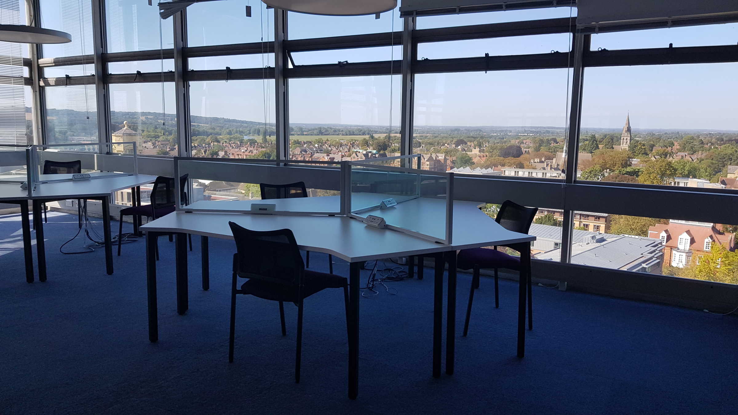 Study area with large windows overlooking Oxford