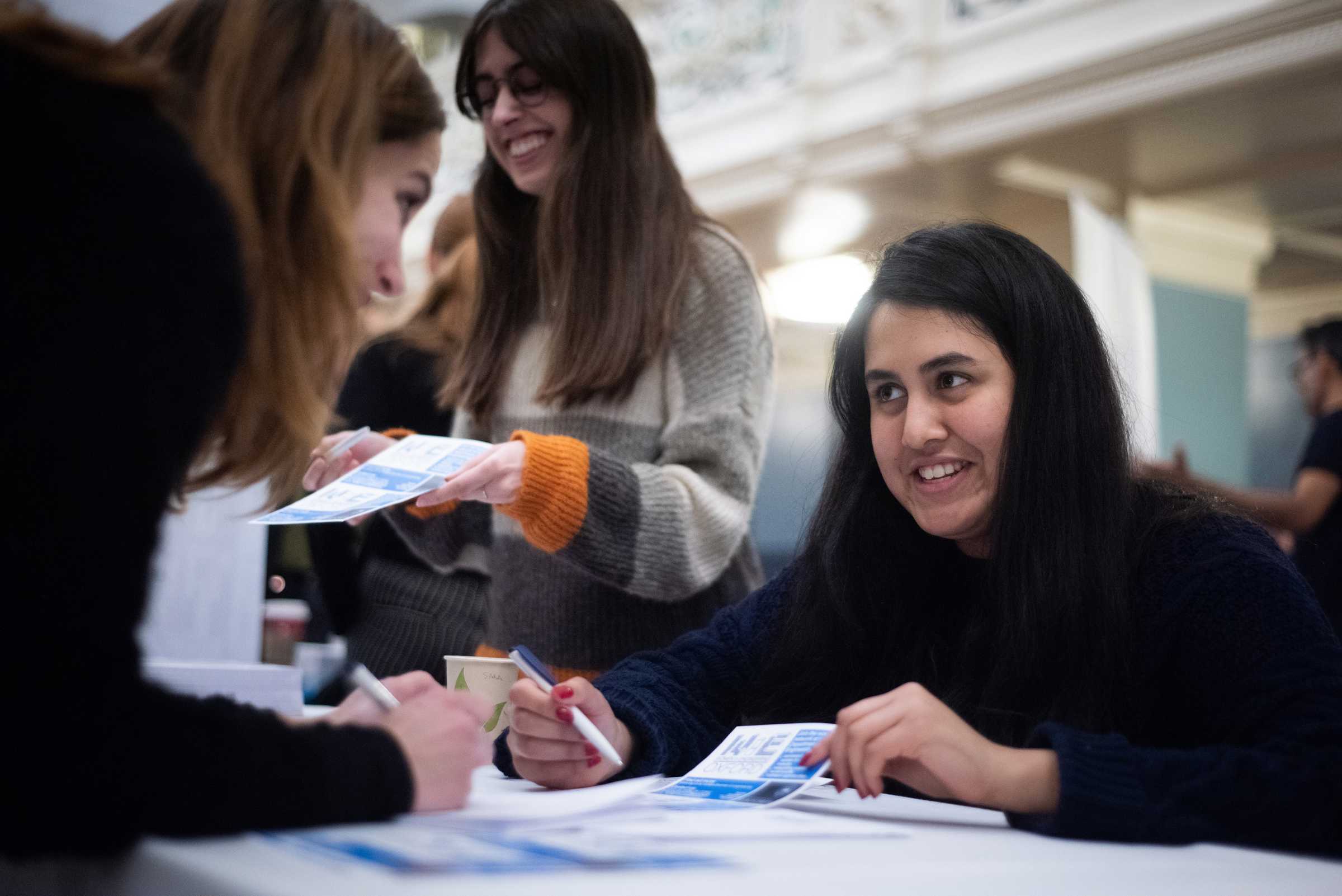 Women in STEM event, January 2020. Female engineers chatting at a stall