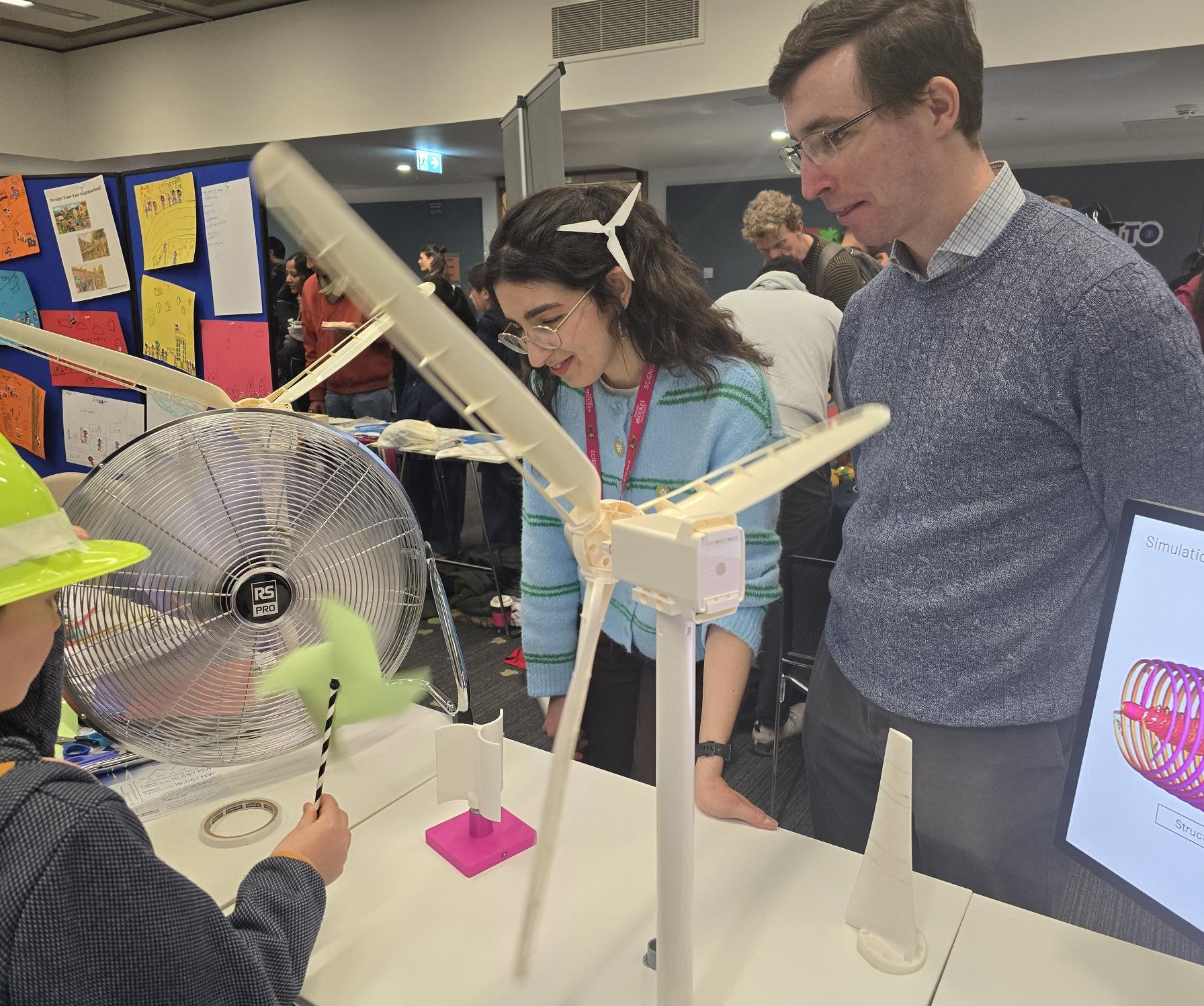 Dr Markella Zormpa and Professor Chris Vogel on the Turning Turbines stand at Oxford Brookes Science Bazaar