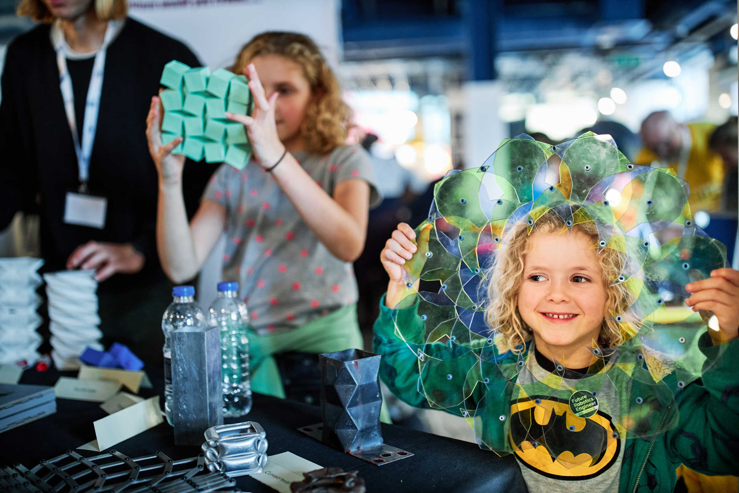 Kids learning about origami at Science Fair