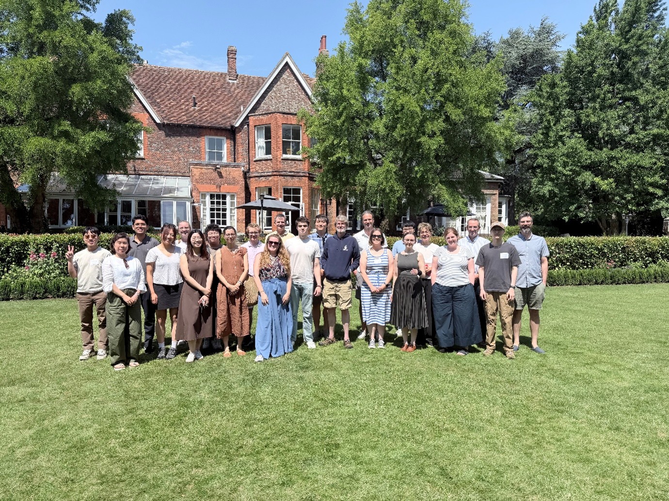 A group shot of team members on the lawn at the annual retreat