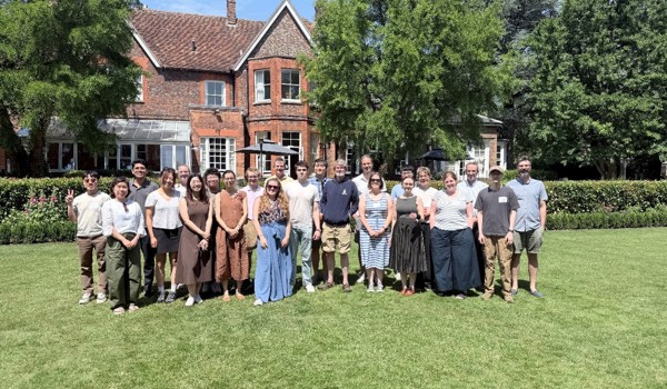 A group shot of team members on the lawn at the annual retreat