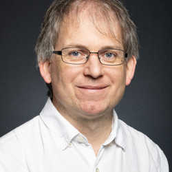 Portrait of Dr Greg Colyer