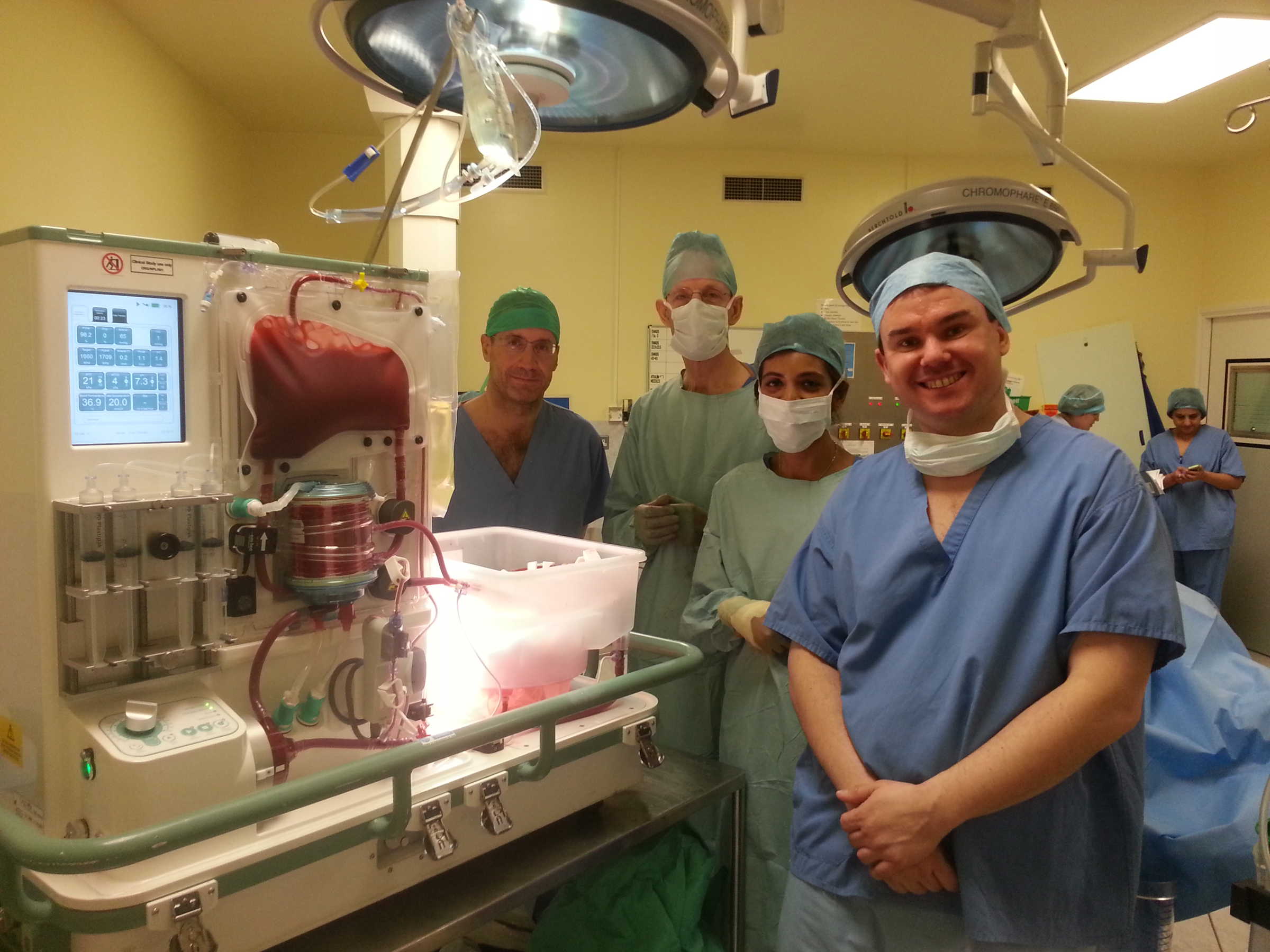 Professor Coussios with Professor Friend and the research team that performed the first successful normothermically preserved liver transplant in 2013