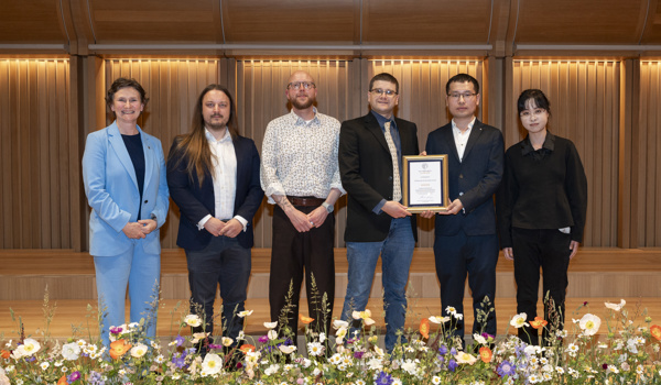 Members of the AutoInspect team being presented with the Collaboration for Innovation Award by the Vice-Chancellor (©John Cairns Photography)