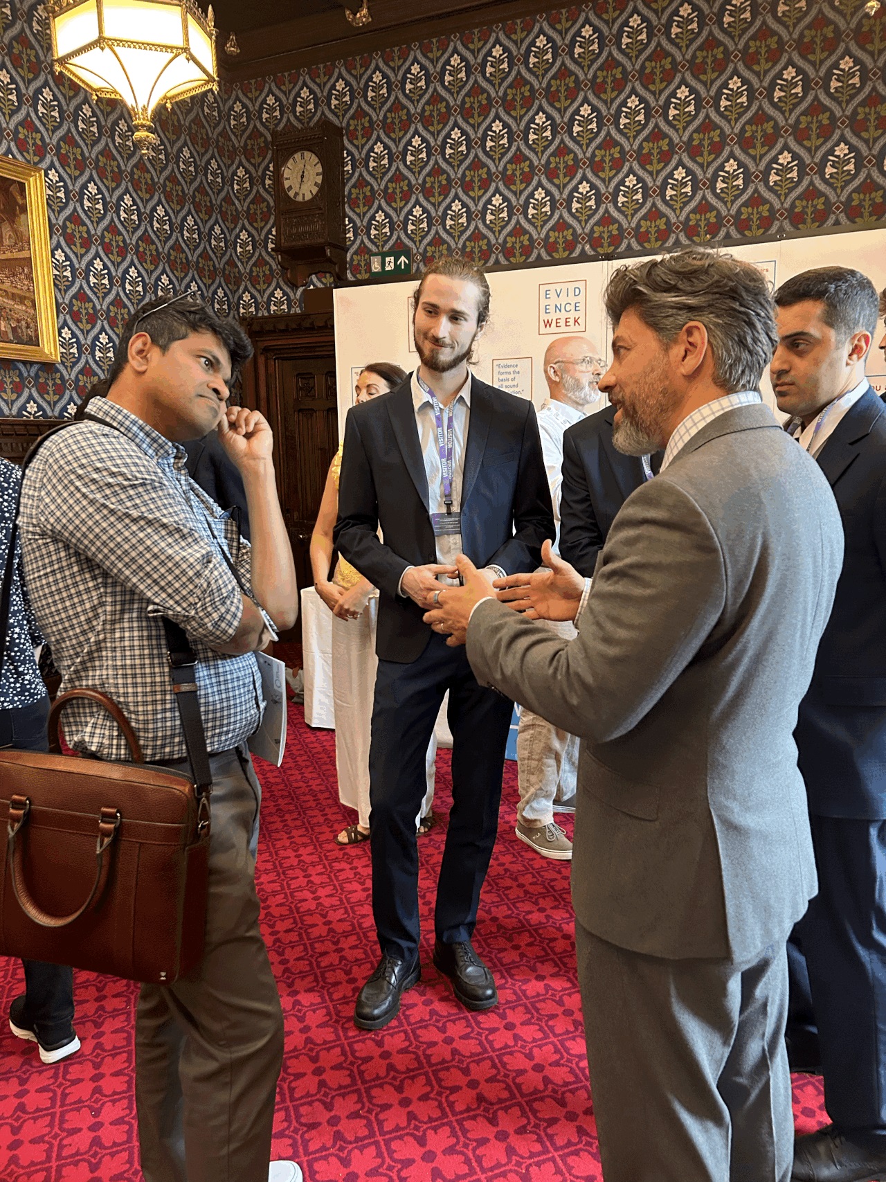 Professor Robert Trager speaks with parliamentarians, policymakers and fellow researchers at Evidence Week 2026