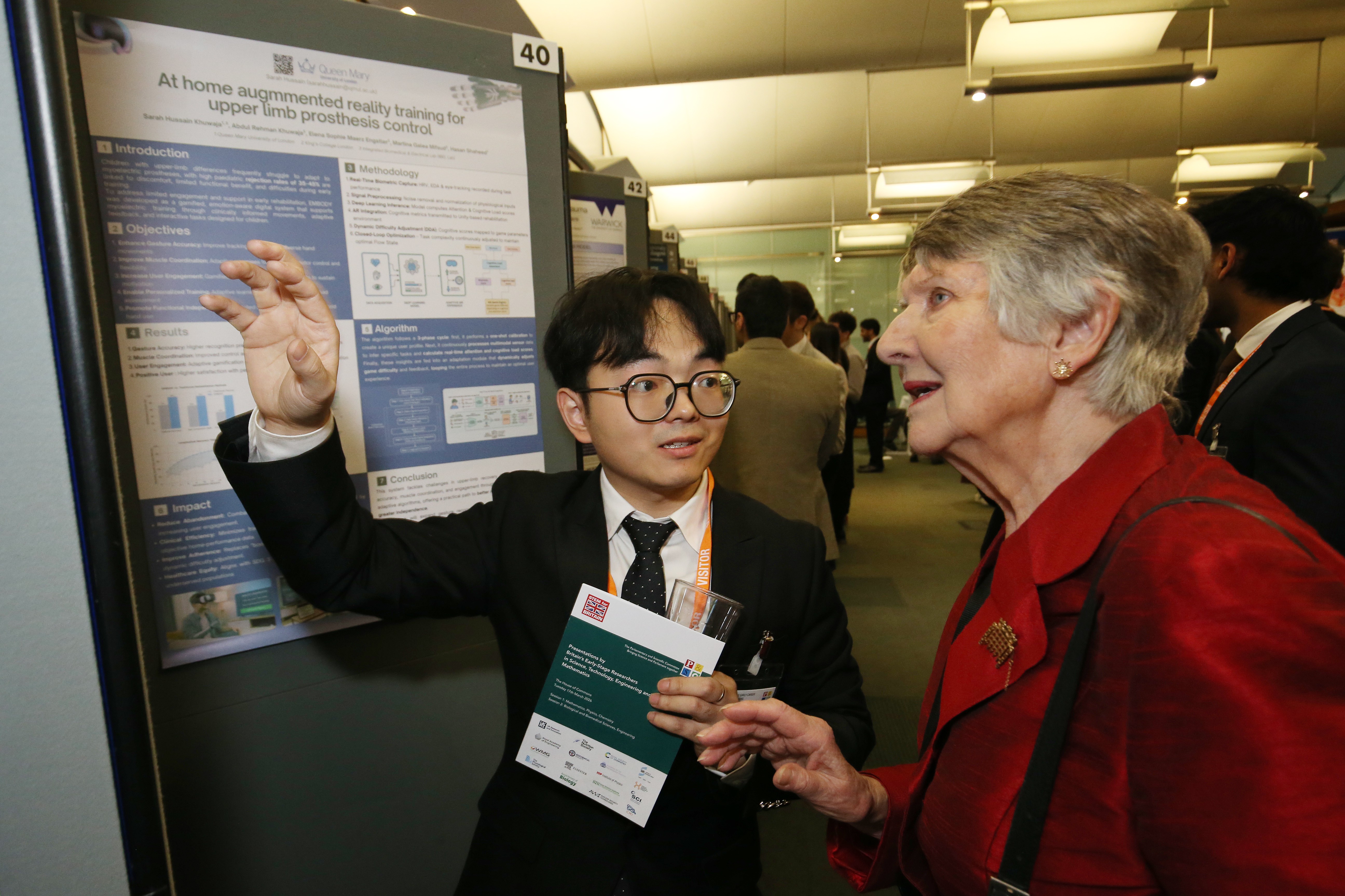 Dr Xiao presents on left, presents his work at STEM for Britain 2026
