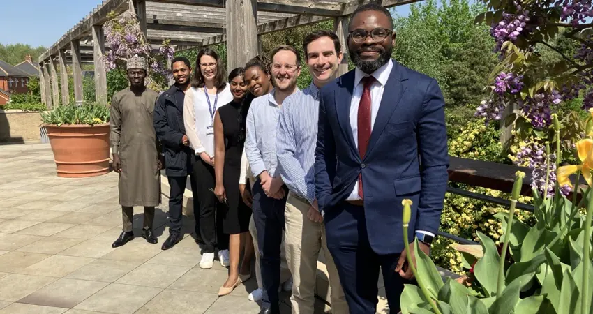Front to back: Ishaq Bolarinwa, Michael McKenna, Dougald Coulson, Uche Awosemo, Rosalind Niharika, Professor Lucia Corsini, Bogosi Msutwana, and Nurudeen Issa.