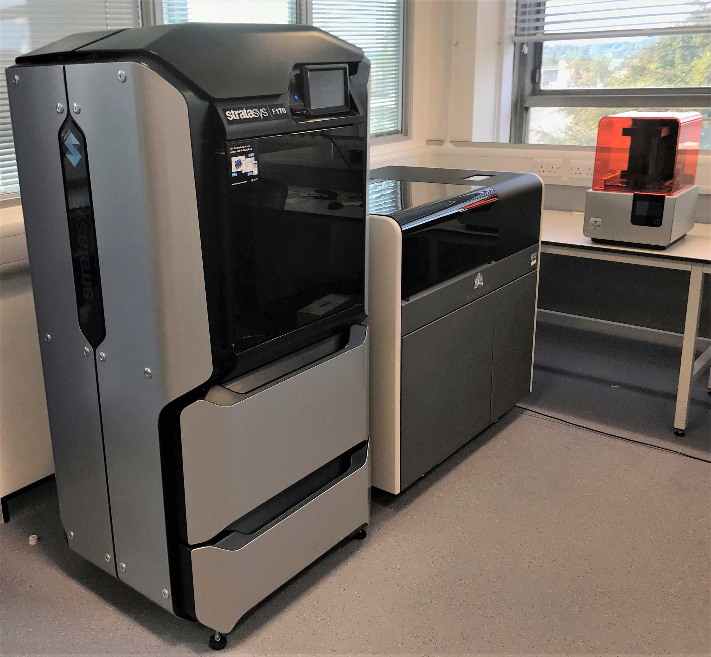 Two large 3D printers