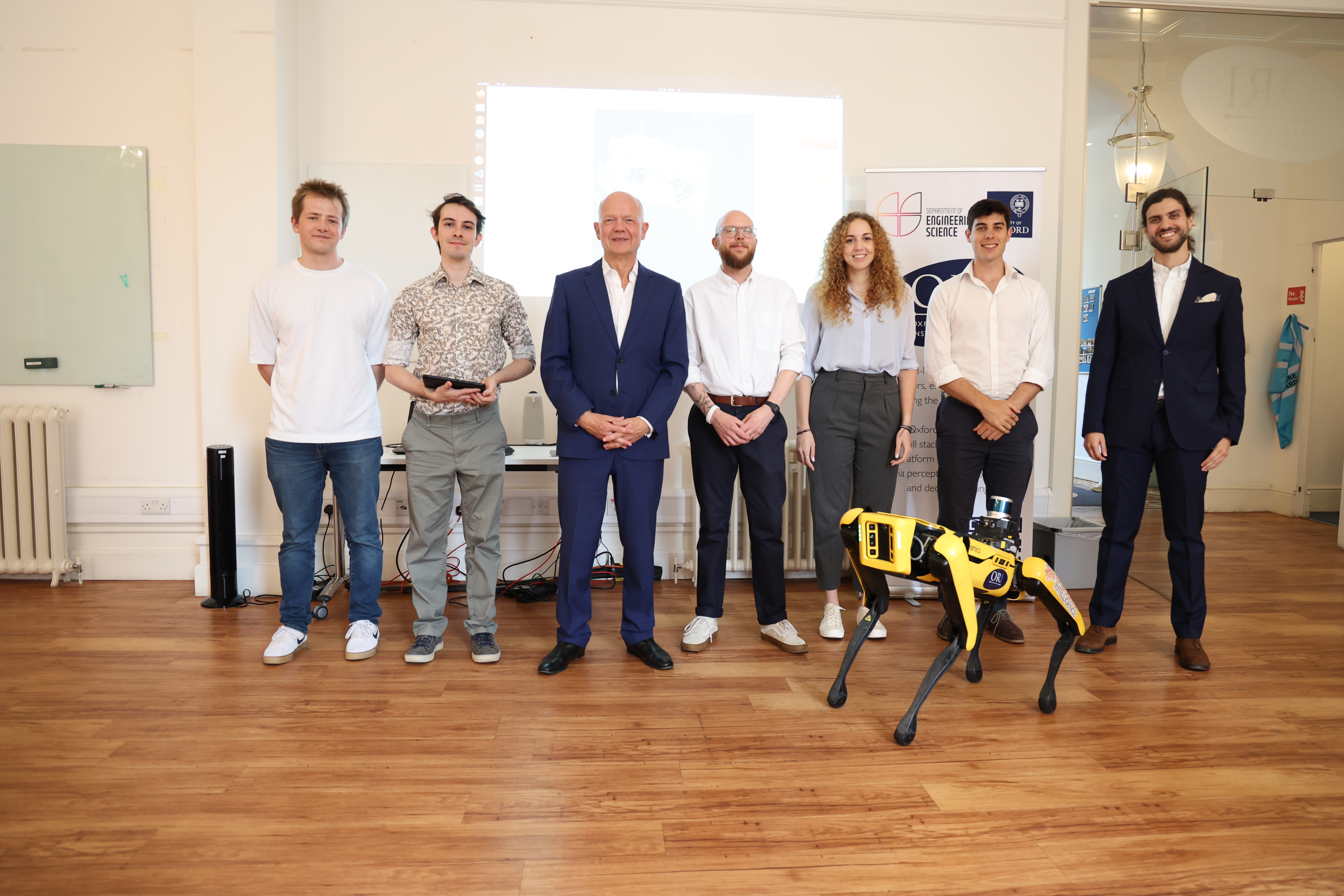 Boston Dynamics Spot pictured with Lord Hague, Prof. Nick Hawes, Daniele De Martini, Luke Robinson, Matthew Budd, Efimia Panagiotaki, Michael Groom