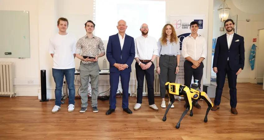 Boston Dynamics Spot pictured with Lord Hague, Prof. Nick Hawes, Daniele De Martini, Luke Robinson, Matthew Budd, Efimia Panagiotaki, Michael Groom