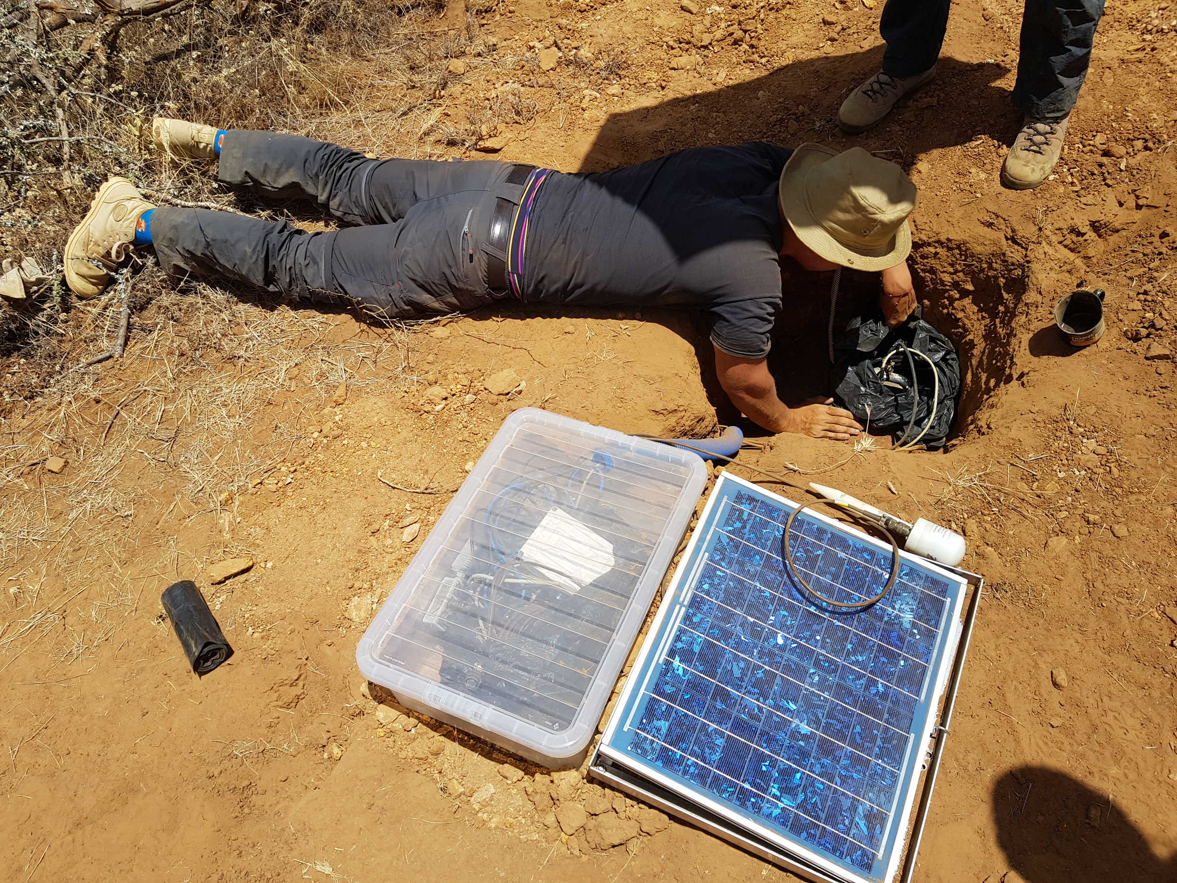 Researchers collecting data from Elephant footprints