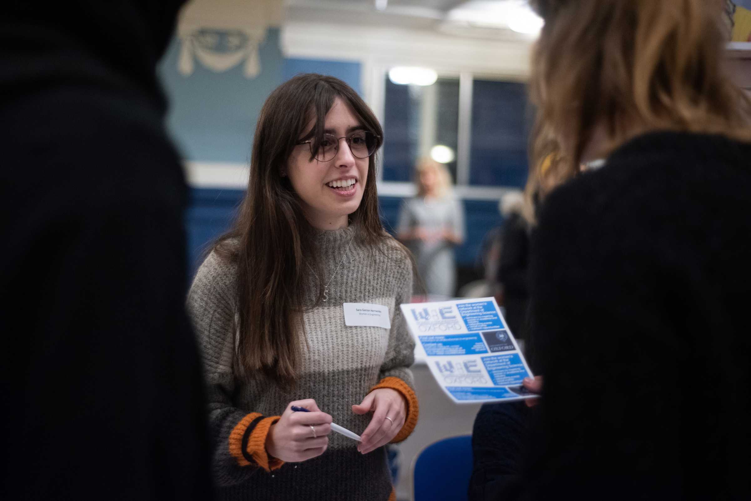 Women in STEM event, January 2020. Female engineers chatting at a stall
