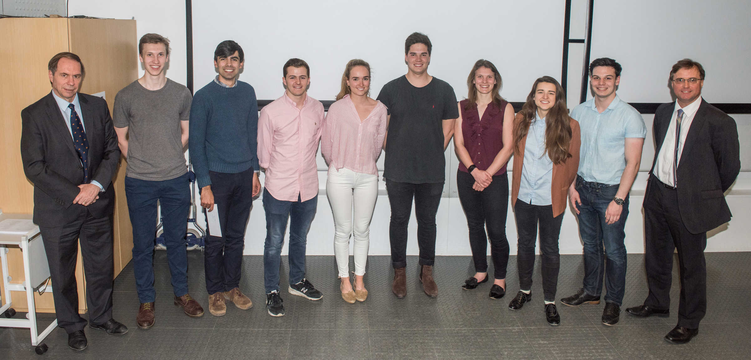 4th year students line up to receive their project poster prize