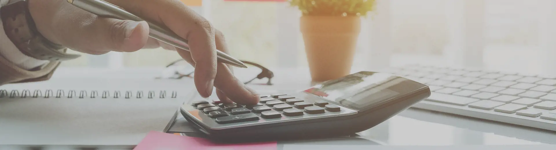 A person using a calculator